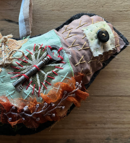 ‘tattered’ bird hanger