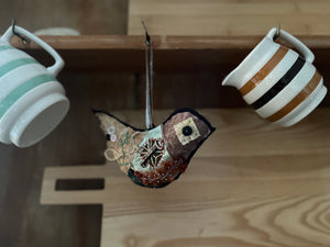 ‘tattered’ bird hanger