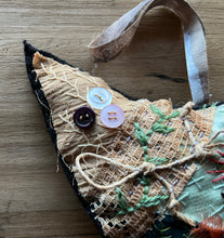 ‘tattered’ bird hanger