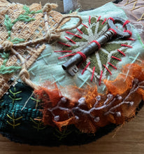 ‘tattered’ bird hanger